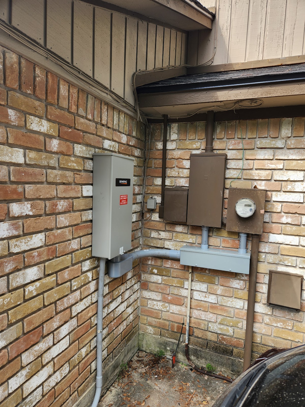 Electrical panel and meter installation on a brick home
